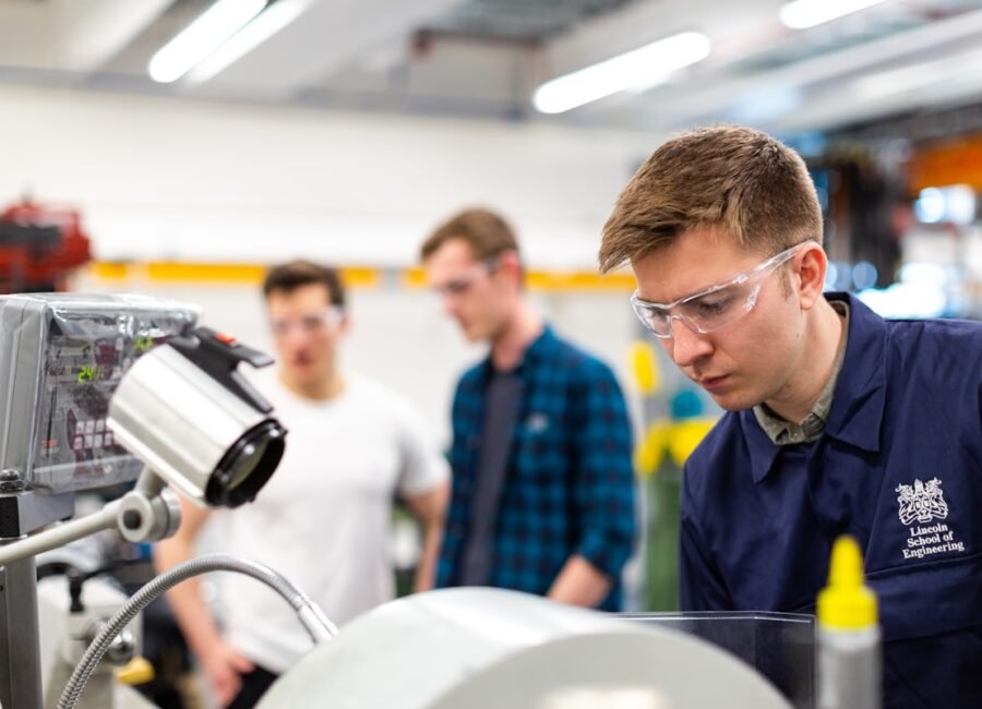 Engineer repairing industrial machinery